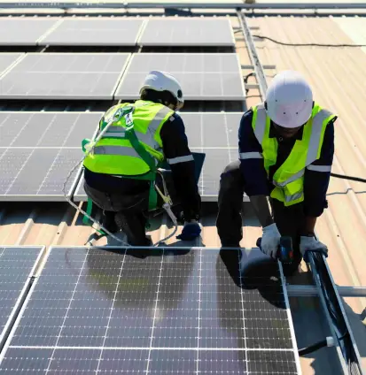 engineers-with-safety-helmet-checking-solar-system-2024-10-11-00-21-41-utc